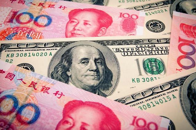 중국 외환당국 속도조절 개입하나...일부 은행에 위안화 매도 경고