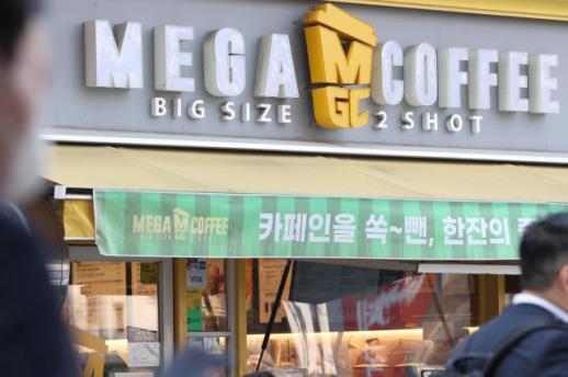 非贵即廉成消费定律 韩国连锁咖啡店淘汰赛加速