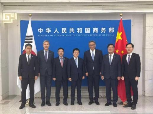 总统特使团在北京会见中国商务部长王文涛