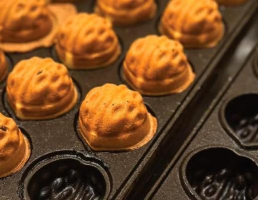 韩国巧用美食外交 韩国传统核桃糕成焦点