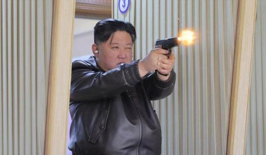 Photos show North Korean leader and daughter firing pistols during on-site inspection