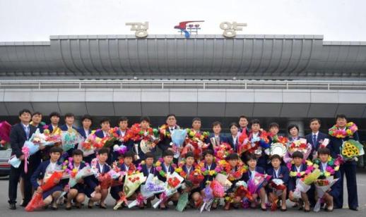 North Korean footballers get heros welcome home after record fifth Asian Cup title