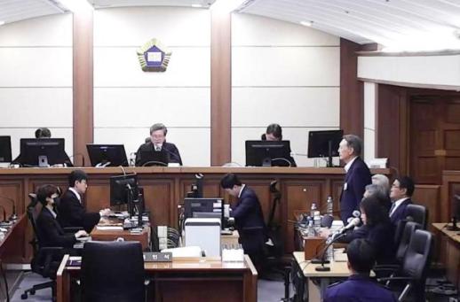 Impeached ex-president cleared of perjury charges in martial law-related case