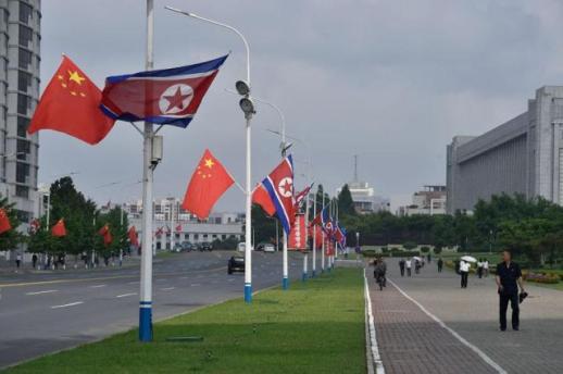 Experts urge peaceful coexistence strategy at timely forum as Xi visits Pyongyang