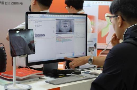 Osstem Implant Enhances OneClick Electronic Chart with AI Features