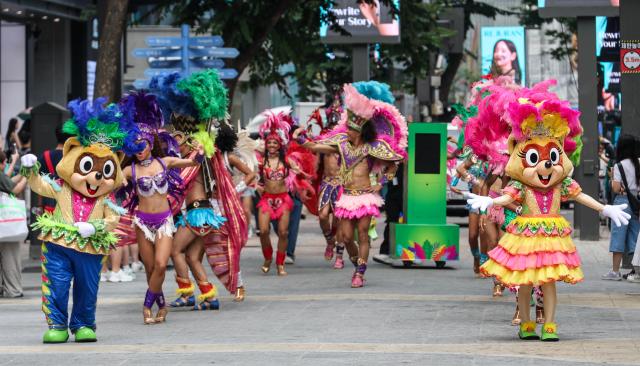 Brazilian Samba parade brings summer energy to Myeong-dong