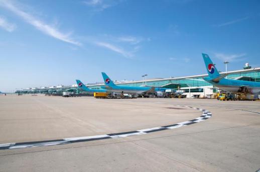 Eased fuel surcharges boost overseas bookings, but keep travelers on short-haul trips