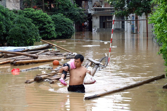 1.3 Million Flee as China Flooding Kills 155
