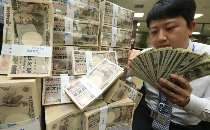 美元兑日元汇率逼近100日元关口