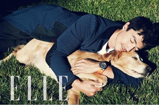 Actor Daniel Henney poses with his dog Mango for ‘Elle’ magazine