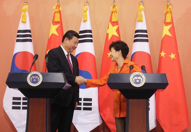 习近平提议共同纪念“抗日战争·韩半岛光复70周年”