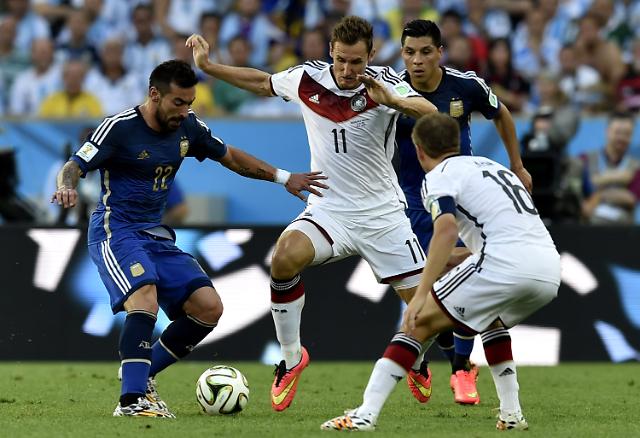 <2014巴西世界杯>德国队1-0阿根廷 时隔24年再夺冠