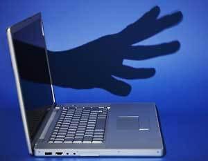 Internet mogul Kim Dotcom denies hacking New Zealand blogger in dirty tricks row