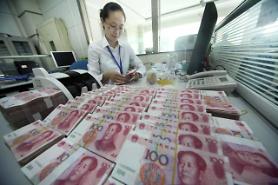 China to crack down on currency speculators to keep yuan stable