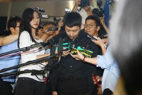 Yoochun released after eight-hour police interrogation