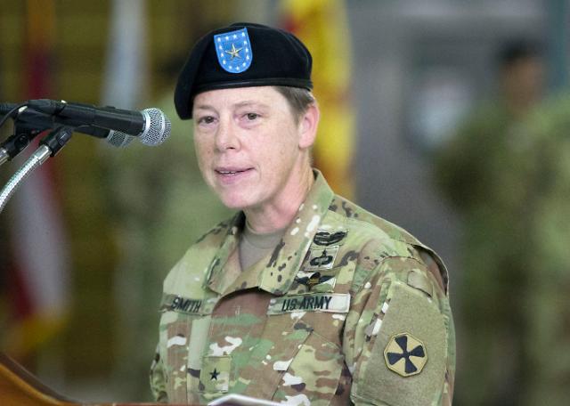 US female brigadier general on duty as deputy commander