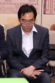 Senior education official punished for dogs and pigs comment