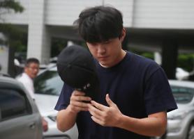 Baseball pitcher gets 10-month suspended sentence for match-fixing