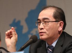 Former N. korean diplomat may put off planned trip to Washington