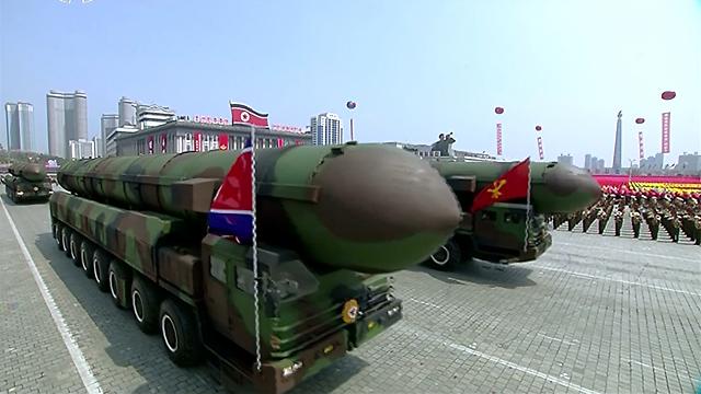  Pyongyang shows off suspected ICBM and new missiles at military parade: Yonhap