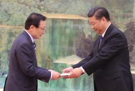 Moon faces tough diplomacy despite signs of thaw in frozen ties with China 