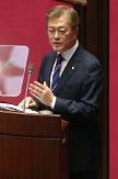 Moon urges quick parliamentary approval of extra government spending 