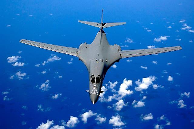 B-1B strategic bomber stages simulated joint strike with stealth fighters