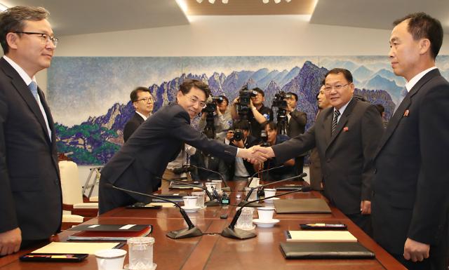 Two Koreas discuss cooperation to restore severed rail lines 