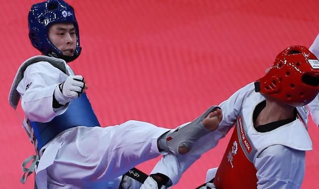 亚运男子跆拳道58公斤级韩国金泰勋夺金