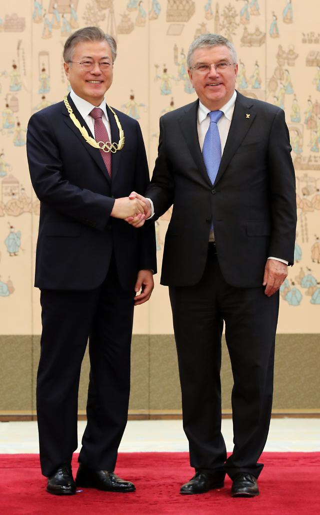 S. Korean president receives highest IOC order: Yonhap