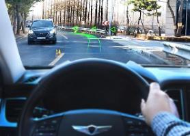 Hyundai car with holographic AR navigation system on display at CES