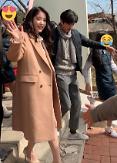 Singer IU makes surprise appearance at high school graduation to congratulate fan