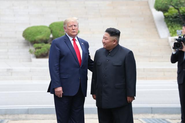 Pyongyangs state media highlights historic meeting between Kim and Trump