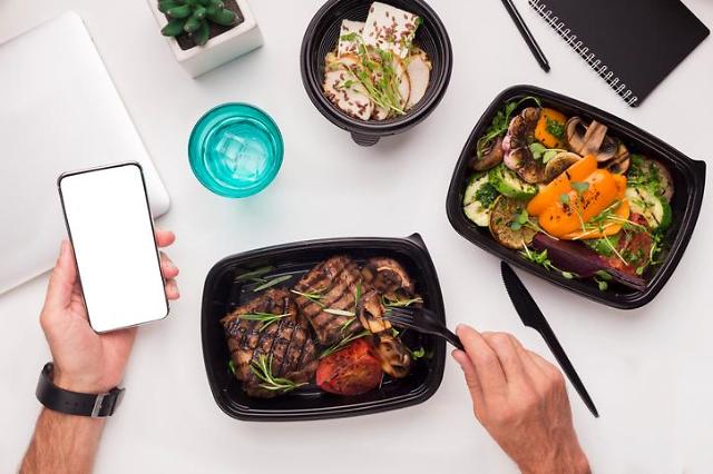 Merger of food delivery service apps face objection by franchise shop owners