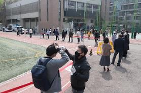 S. Korea goes ahead with parliamentary election despite overriding concern over COVID-19