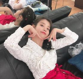 Singer IU collaborates with BTS Suga to release new song in May