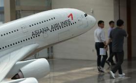 Korean Air takes risky option to take over debt-stricken domestic rival Asiana   