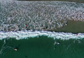 Daredevil surfers to be fined for ignoring storm warning
