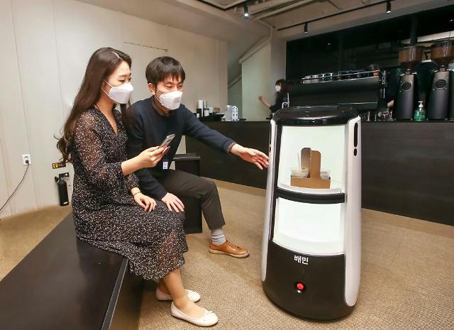 Woowas intelligent delivery robot awaits crucial test operation at modern building in central Seoul