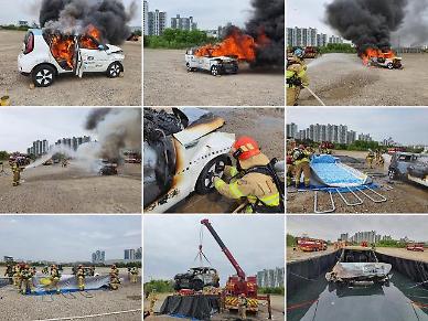 ​Firefighter cadets carry out drill to snuff out EV fire using portable water tank