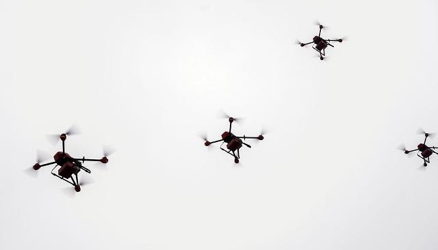 Formation-flying drones demonstrated to deliver sandwiches in northeastern city 