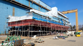 Passenger-cargo ship installed with mobile electric power supply system awaits launching ceremony