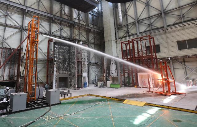 Rapid fire suppression system developed to spray water to fire origins like firefighters