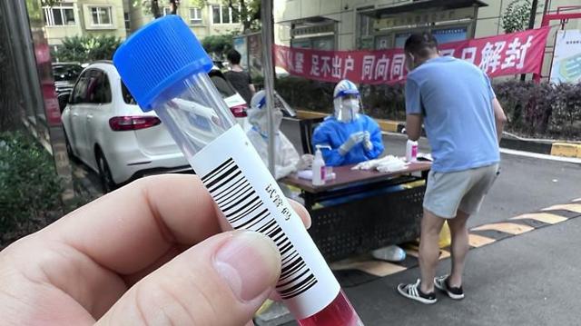 中国公布新版防疫方案：密切接触者、入境人员隔离14+7调整为7+3