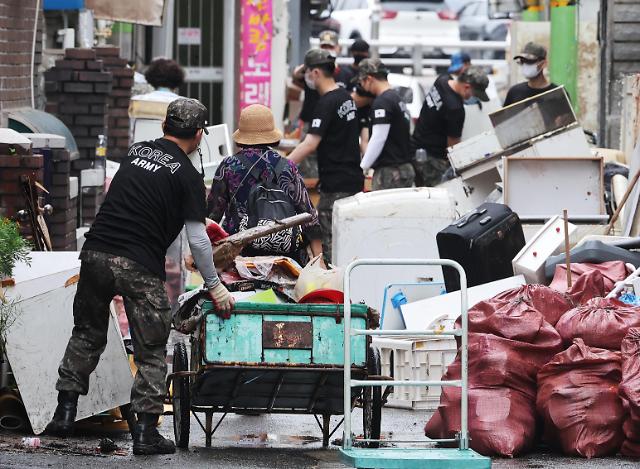 韩国首都圈暴雨遇难人数上升至13人
