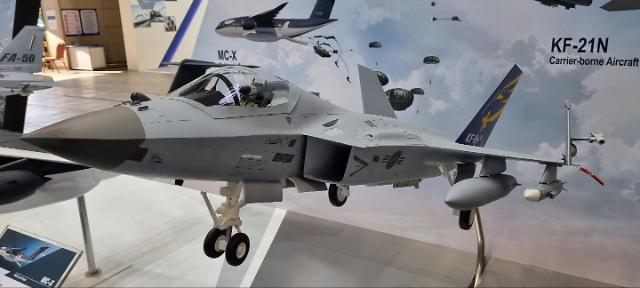 KAI displays model plane at defense exhibition as potential carrier-born aircraft