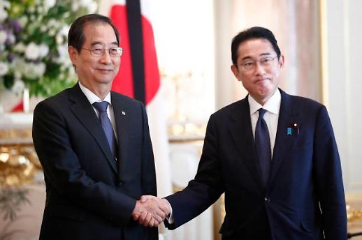 日本首相岸田文雄会见韩国总理韩悳洙