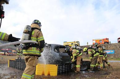 Firefighters test various tactics against EV battery fire through simulated drill