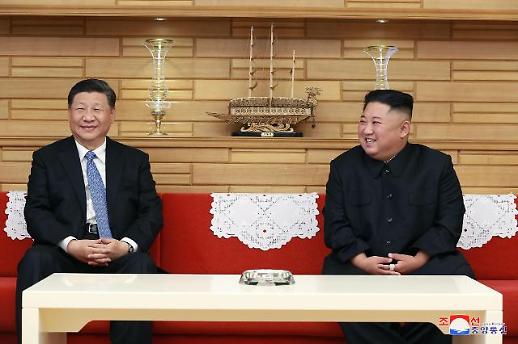 习近平回电金正恩感谢率先电唁江泽民