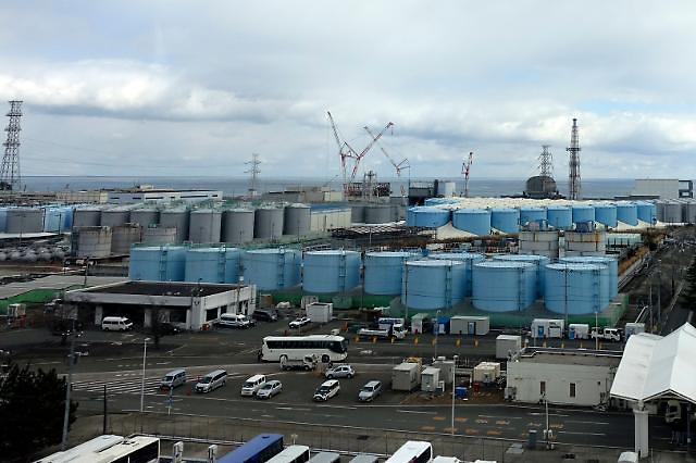 Japan decides to discharge contaminated water from Fukushima nuclear accident site into sea